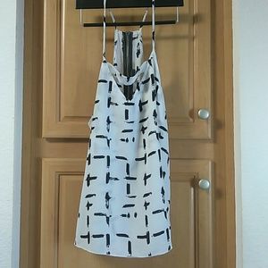 Toto ,top with zipper on back.